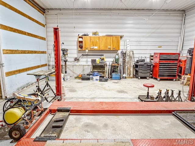 garage with a workshop area