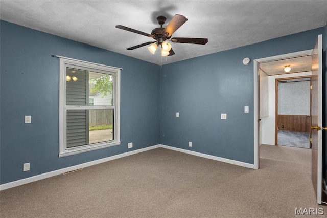 418 E Maple St, Gillespie, IL 62033 - carpeted spare room with ceiling fan, baseboards, and a smoke detector