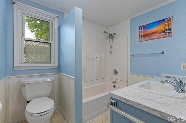 418 E Maple St, Gillespie, IL 62033 - bathroom featuring a wainscoted wall, toilet, shower / washtub combination, vanity, and crown molding