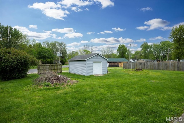 418 E Maple St, Gillespie, IL 62033 - view of yard with an outbuilding, a storage unit, and a detached garage