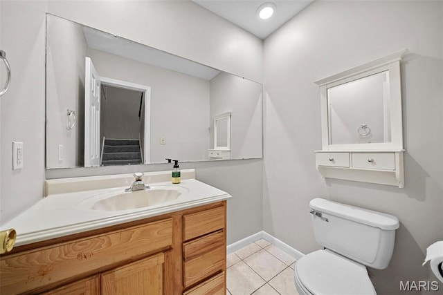 2104 Gascony Dr Unit 2104, Lake St Louis, MO 63367 - bathroom with tile patterned flooring, toilet, baseboards, and vanity