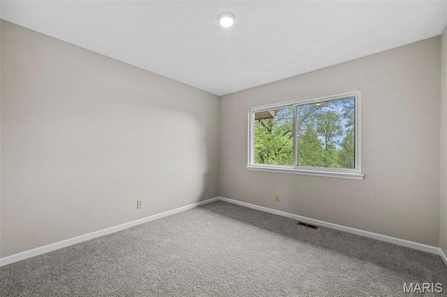 2104 Gascony Dr Unit 2104, Lake St Louis, MO 63367 - spare room with baseboards and carpet