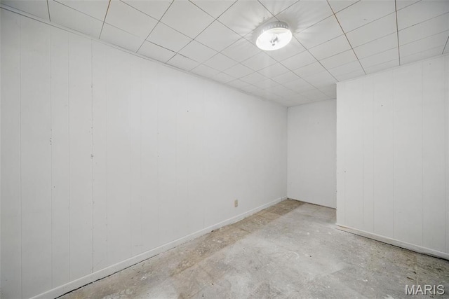 2104 Gascony Dr Unit 2104, Lake St Louis, MO 63367 - spare room featuring concrete floors and wood walls