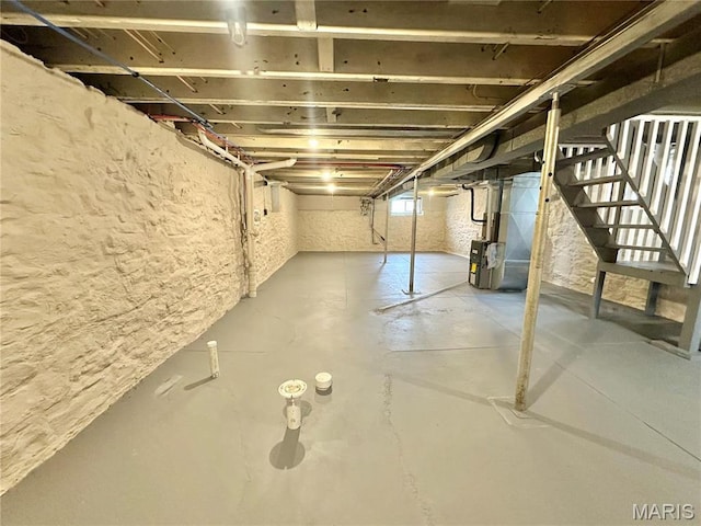 2806 Keokuk St, Saint Louis, MO 63118 - basement featuring stairway and heating unit