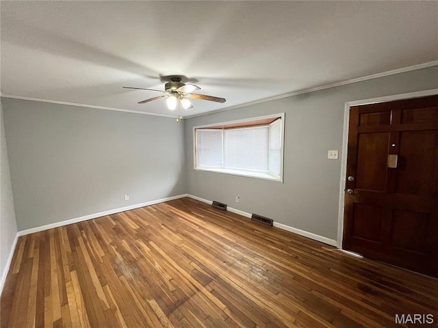 1237 Coal Bank Ct, Saint Louis, MO 63138 - entryway featuring ceiling fan, crown molding, wood-type flooring, and baseboards