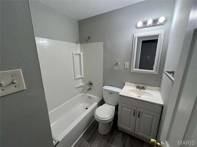 1237 Coal Bank Ct, Saint Louis, MO 63138 - full bath featuring wood finished floors, toilet, shower / washtub combination, and vanity