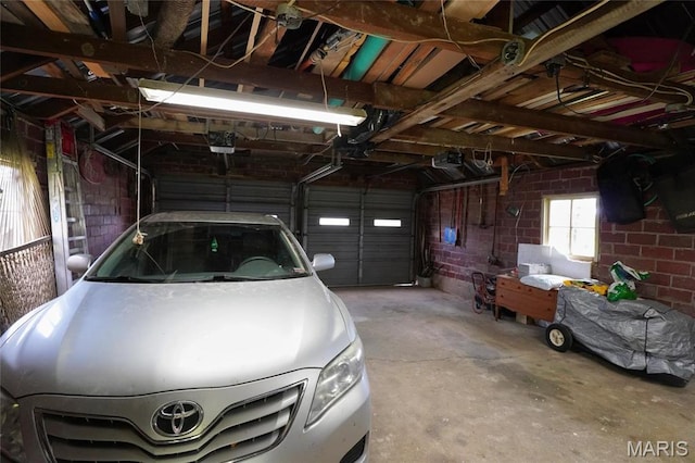 garage featuring a garage door opener