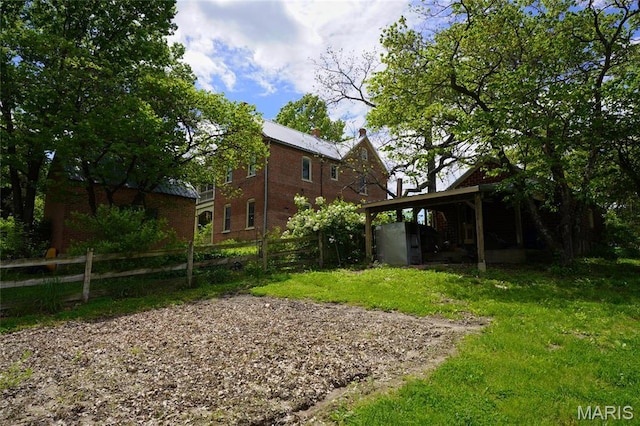 view of yard featuring fence