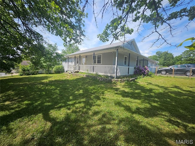 24355 Trolley Ln, Saint Robert, MO 65584 - view of property exterior with covered porch