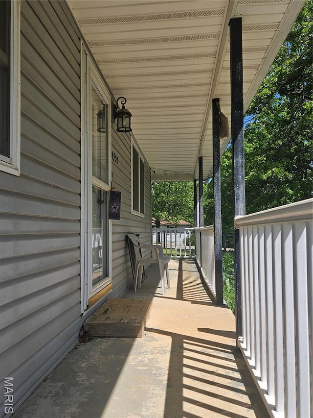 24355 Trolley Ln, Saint Robert, MO 65584 - view of patio / terrace with a porch