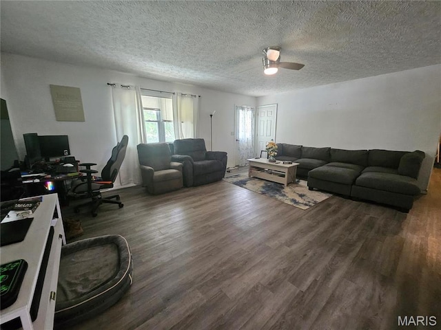 24355 Trolley Ln, Saint Robert, MO 65584 - living room featuring an office area, wood finished floors, ceiling fan, and a textured ceiling