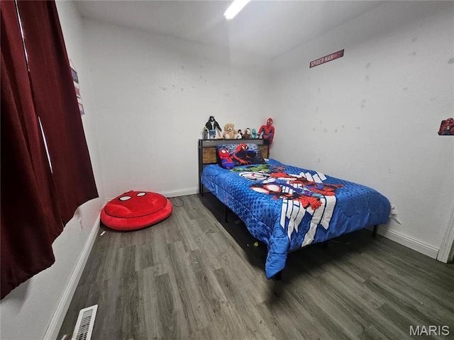 24355 Trolley Ln, Saint Robert, MO 65584 - bedroom with wood finished floors and baseboards