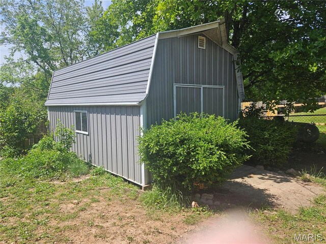 24355 Trolley Ln, Saint Robert, MO 65584 - view of outdoor structure featuring fence and an outbuilding