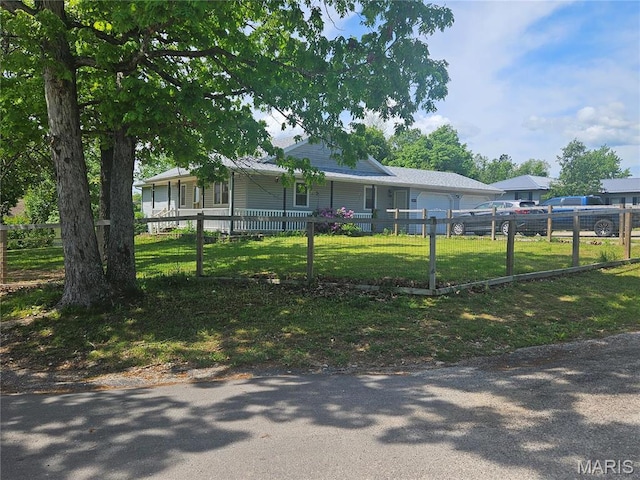 24355 Trolley Ln, Saint Robert, MO 65584 - view of front of home with a garage