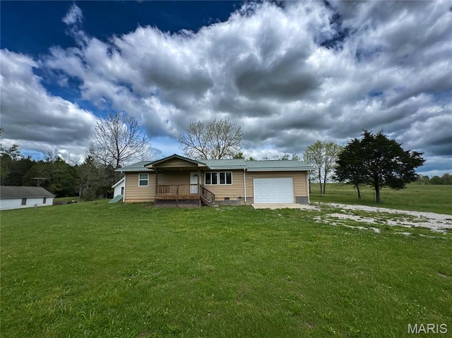 10268 Sunlight Rd, Belgrade, MO 63622 - view of front of house with a garage, a front yard, metal roof, and crawl space