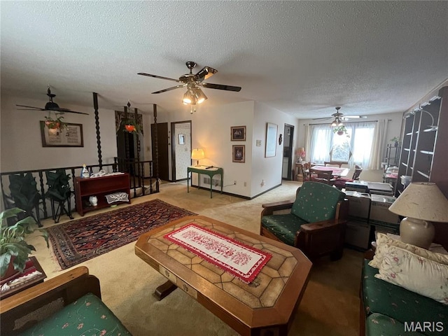 152 Burchwood Dr, St James, MO 65559 - living area featuring ceiling fan, a textured ceiling, and carpet floors