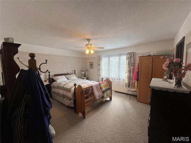 152 Burchwood Dr, St James, MO 65559 - bedroom with a textured ceiling, light colored carpet, and a ceiling fan
