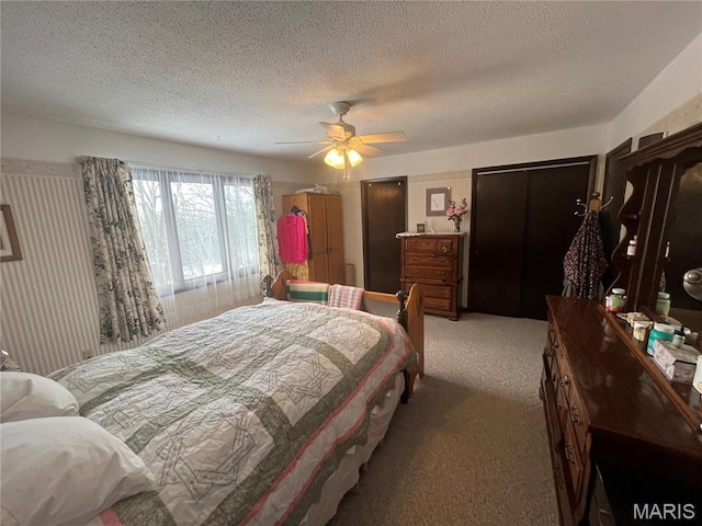 152 Burchwood Dr, St James, MO 65559 - bedroom featuring light colored carpet, a textured ceiling, and a ceiling fan