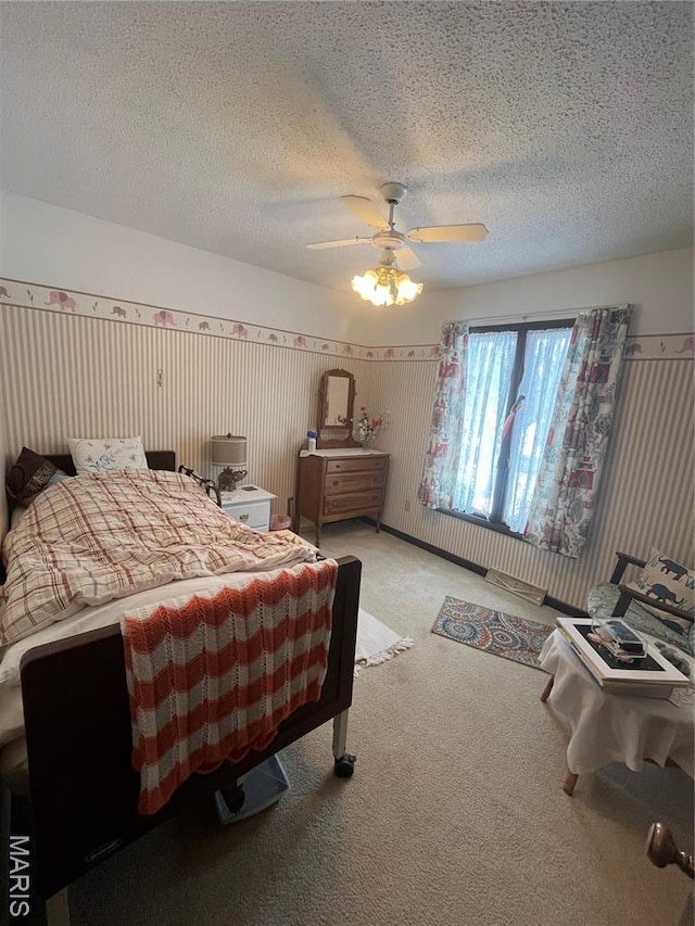 152 Burchwood Dr, St James, MO 65559 - bedroom with light carpet, ceiling fan, a textured ceiling, and wallpapered walls