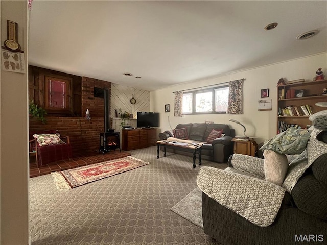 152 Burchwood Dr, St James, MO 65559 - carpeted living area featuring a wood stove