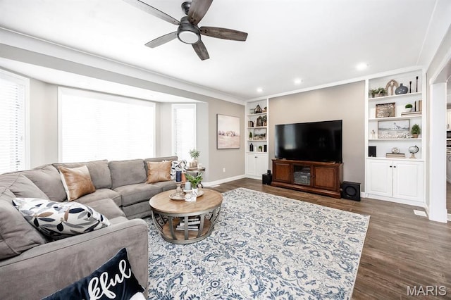 9 Shellie Ct, Fairview Heights, IL 62208 - living room with a ceiling fan, baseboards, dark wood-type flooring, built in features, and crown molding