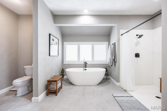 9 Shellie Ct, Fairview Heights, IL 62208 - bathroom with toilet, a soaking tub, a shower with curtain, and baseboards