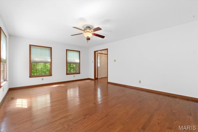 3743 Rock Creek Valley Rd, High Ridge, MO 63049 - spare room with baseboards, a ceiling fan, and wood finished floors