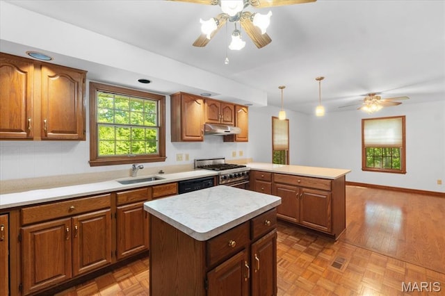 3743 Rock Creek Valley Rd, High Ridge, MO 63049 - kitchen with ceiling fan, stainless steel range, a peninsula, and light countertops
