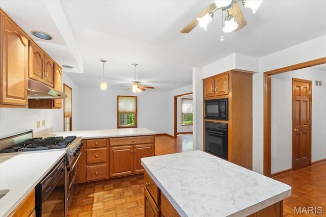 3743 Rock Creek Valley Rd, High Ridge, MO 63049 - kitchen featuring black appliances, under cabinet range hood, a ceiling fan, and light countertops