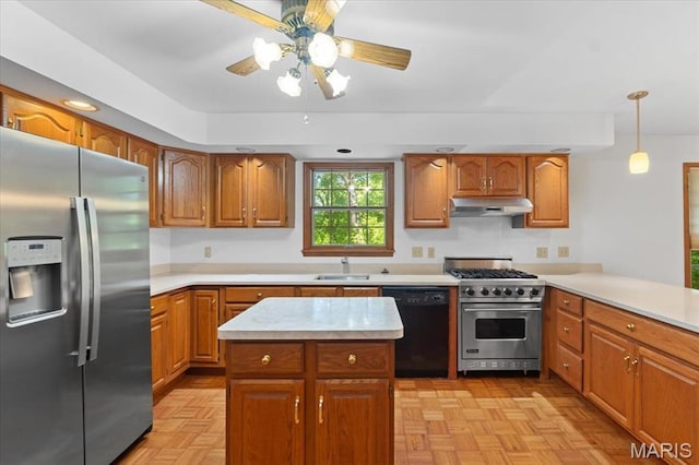 3743 Rock Creek Valley Rd, High Ridge, MO 63049 - kitchen featuring stainless steel appliances, under cabinet range hood, light countertops, a sink, and brown cabinets