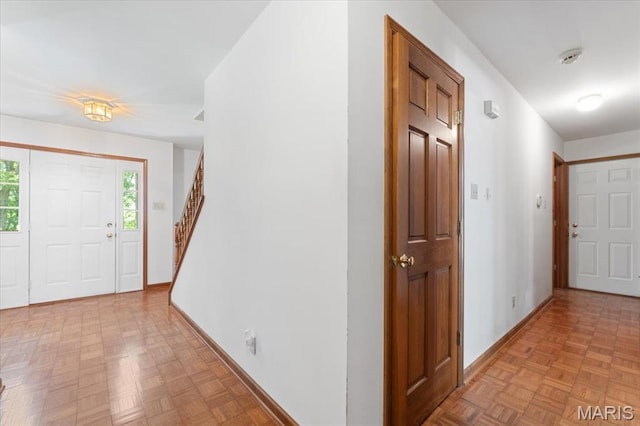 3743 Rock Creek Valley Rd, High Ridge, MO 63049 - foyer entrance featuring baseboards and stairway