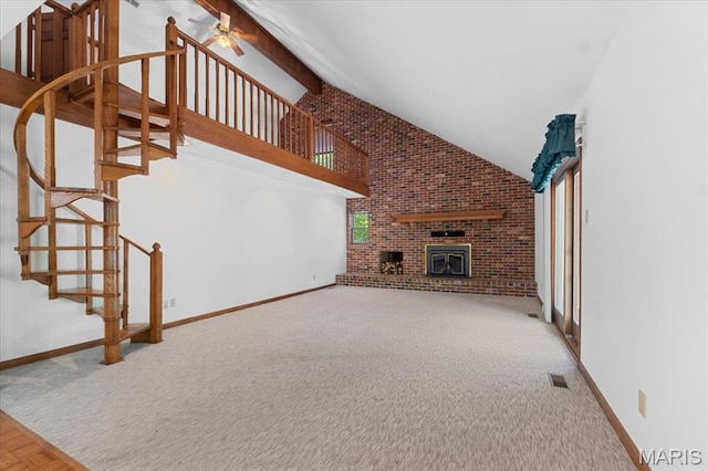 3743 Rock Creek Valley Rd, High Ridge, MO 63049 - unfurnished living room featuring carpet floors, high vaulted ceiling, ceiling fan, stairway, and baseboards
