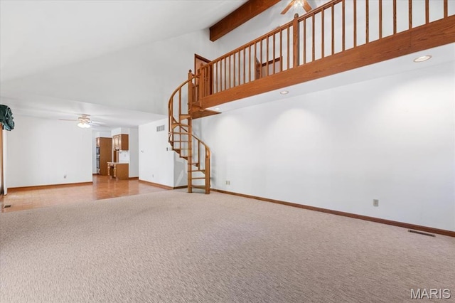 3743 Rock Creek Valley Rd, High Ridge, MO 63049 - unfurnished living room with a ceiling fan, high vaulted ceiling, carpet floors, stairway, and baseboards