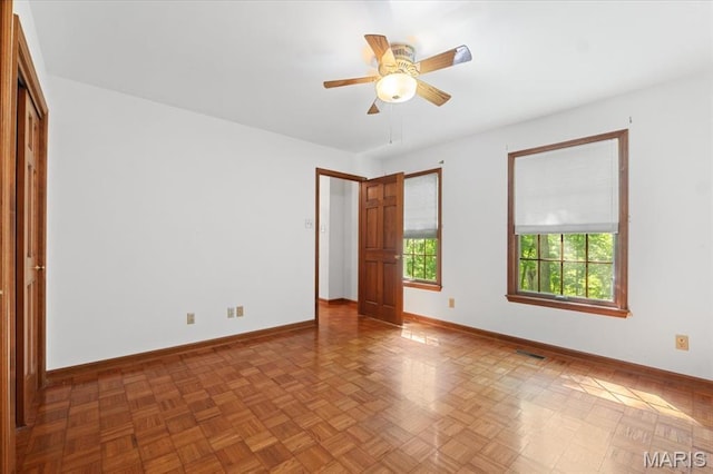 3743 Rock Creek Valley Rd, High Ridge, MO 63049 - unfurnished bedroom featuring baseboards and ceiling fan