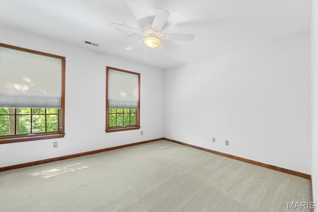 3743 Rock Creek Valley Rd, High Ridge, MO 63049 - carpeted spare room featuring healthy amount of natural light, baseboards, and ceiling fan