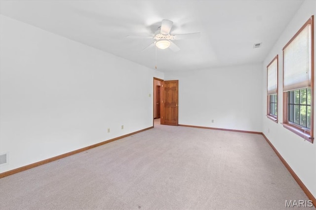 3743 Rock Creek Valley Rd, High Ridge, MO 63049 - empty room with light carpet, baseboards, and ceiling fan