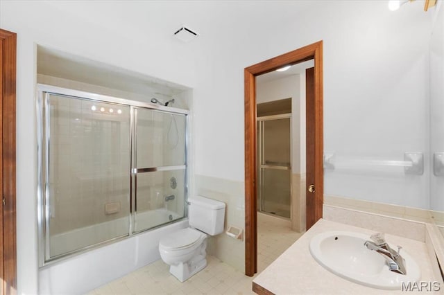 3743 Rock Creek Valley Rd, High Ridge, MO 63049 - full bathroom featuring toilet, combined bath / shower with glass door, and vanity