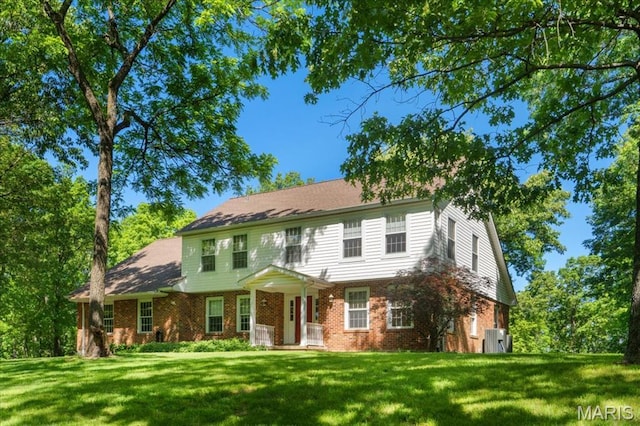 3743 Rock Creek Valley Rd, High Ridge, MO 63049 - view of front facade with brick siding and a front yard