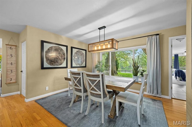 350 Barnett Dr, Edwardsville, IL 62025 - dining area with wood finished floors and baseboards