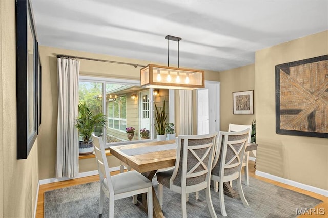 350 Barnett Dr, Edwardsville, IL 62025 - dining room featuring baseboards and light wood-style floors