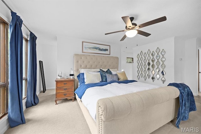 350 Barnett Dr, Edwardsville, IL 62025 - bedroom with light colored carpet, ceiling fan, and baseboards