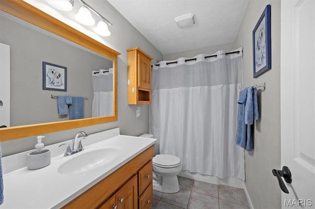 350 Barnett Dr, Edwardsville, IL 62025 - full bathroom with toilet, tile patterned floors, and vanity