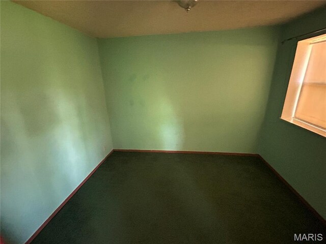 1923 Ridgeway Dr, Arnold, MO 63010 - spare room featuring baseboards and carpet floors