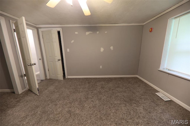 226 N 8th St, Belleville, IL 62220 - unfurnished room featuring carpet, ceiling fan, ornamental molding, baseboards, and healthy amount of natural light