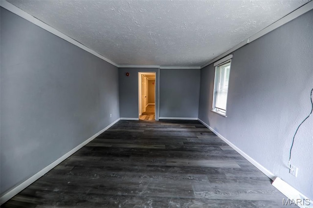 226 N 8th St, Belleville, IL 62220 - unfurnished room featuring a textured ceiling, wood finished floors, and baseboards