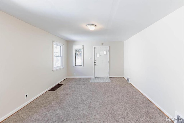 7150 Beulah Ave, Saint Louis, MO 63136 - carpeted empty room with baseboards