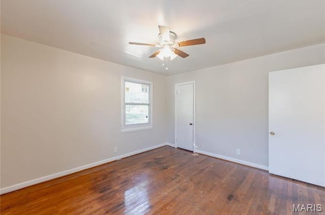 7150 Beulah Ave, Saint Louis, MO 63136 - unfurnished room with ceiling fan, wood finished floors, and baseboards