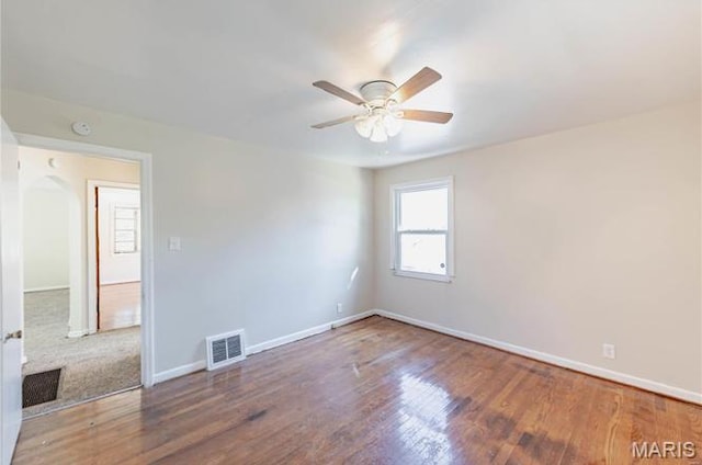 7150 Beulah Ave, Saint Louis, MO 63136 - empty room with a ceiling fan, baseboards, wood finished floors, and a smoke detector