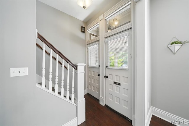 3015 Indiana Ave, Saint Louis, MO 63118 - foyer entrance featuring wood finished floors, stairs, and baseboards