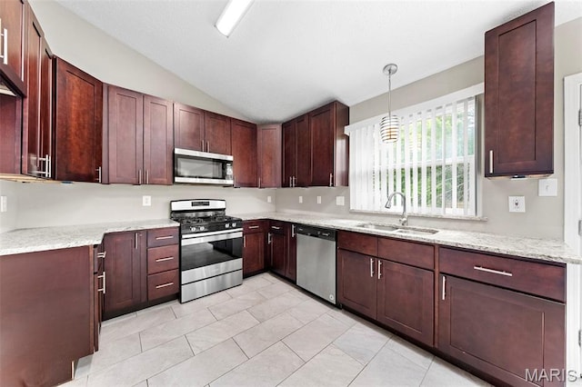 2713 Chapel View Dr, Florissant, MO 63031 - kitchen featuring stainless steel appliances, a sink, vaulted ceiling, light stone countertops, and light tile patterned floors